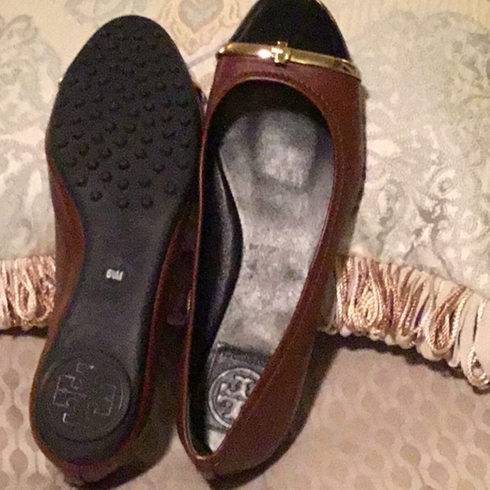 Tory Burch Brown and Black shoes.  Worn once.